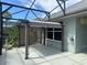 Outdoor patio with cabana, showcasing beautiful fountain and backyard at 7873 Crosswinds Way, Mount Dora, FL 32757
