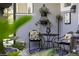 Cozy patio features stylish decor, a small table, and comfortable seating at 7873 Crosswinds Way, Mount Dora, FL 32757