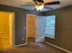 Bedroom featuring closet, window, and entry into adjoining area, providing comfortable living space at 825 Mary Frank Ct, Mount Dora, FL 32757