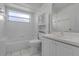 Bright bathroom with a combined tub and shower at 8527 Firestone Cir, Clermont, FL 34711