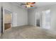 Large bedroom with adjacent bathroom and walk-in closet provides ample space at 8527 Firestone Cir, Clermont, FL 34711