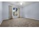 Bedroom filled with natural light from the large window at 8527 Firestone Cir, Clermont, FL 34711