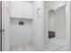 Laundry room located near the hallway at 8527 Firestone Cir, Clermont, FL 34711