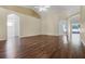 Spacious living area with hardwood floors, vaulted ceilings, and an open layout, offering plenty of room for relaxation at 8527 Firestone Cir, Clermont, FL 34711