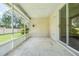 Screened patio overlooking the backyard at 8527 Firestone Cir, Clermont, FL 34711
