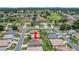 Aerial view of a residential community located on a golf course with mature landscaping at 8652 Se 133Rd Ln, Summerfield, FL 34491