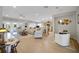 Open-concept living room with recessed lighting and hardwood floors at 8652 Se 133Rd Ln, Summerfield, FL 34491