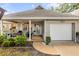 Charming single-story home with a welcoming front porch and attached one car garage at 8712 Sw 92Nd Pl # D, Ocala, FL 34481