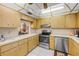 Open kitchen with stainless steel appliances at 8712 Sw 92Nd Pl # D, Ocala, FL 34481