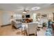 Cozy living room featuring hardwood floors, natural light, and views to front entrance at 8712 Sw 92Nd Pl # D, Ocala, FL 34481