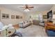 Cozy living room with comfortable seating and a bright window for natural light at 8712 Sw 92Nd Pl # D, Ocala, FL 34481