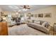 Spacious living room with neutral decor, hardwood floors, and a comfortable seating area at 8712 Sw 92Nd Pl # D, Ocala, FL 34481