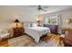 Comfortable main bedroom with a large window and plush carpeting at 8712 Sw 92Nd Pl # D, Ocala, FL 34481