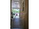 Exterior view of entry featuring a security gate to the property at 1104 Flamingo Dr, Leesburg, FL 34748