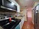 Efficient kitchen featuring modern appliances and a functional layout at 1104 Flamingo Dr, Leesburg, FL 34748