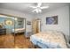 Secondary bedroom with large closet and lots of natural light at 1146 W Boone Ct, Lady Lake, FL 32159