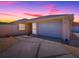 Charming single-story home featuring an attached two-car garage, and a well-maintained lawn at 1202 Fernando Ln, The Villages, FL 32159