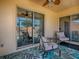 Relaxing lanai with comfortable seating and a view of the outdoor patio at 1202 Fernando Ln, The Villages, FL 32159