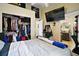Bedroom with closet and view into the en-suite bathroom at 1204 Monterey Dr, Eustis, FL 32726