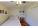 Cozy bedroom featuring a comfortable bed and plenty of natural light at 1224 Lakeview Dr, Clermont, FL 34711