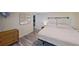 Bedroom featuring a light wall paint color, a large bed, and natural lighting at 1224 Lakeview Dr, Clermont, FL 34711
