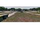 A residential street with a well-kept lawn in a quiet neighborhood, offering a peaceful setting at 1224 Lakeview Dr, Clermont, FL 34711