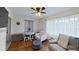 Bright living area with a mix of seating options and a view of the outdoors at 1224 Lakeview Dr, Clermont, FL 34711