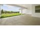 Open patio with expansive views of the lush green landscape at 12565 Cynthia Ln, Clermont, FL 34715