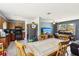 Inviting open-concept living room and kitchen layout perfect for Gathering gatherings and entertaining guests at 1406 Hope Ct, Tavares, FL 32778