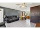 Open living area with tile floors, view to bedroom, and natural lighting at 1406 Hope Ct, Tavares, FL 32778