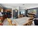 The Living Room, connected to the Kitchen, provides flexible living at 1406 Hope Ct, Tavares, FL 32778