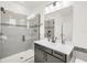 Modern bathroom boasts a glass-enclosed shower, a sleek vanity, and stylish fixtures, providing a luxurious and comfortable space at 14907 Guava Bay Dr, Winter Garden, FL 34787