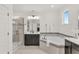 Elegant bathroom features separate vanities, walk-in shower, and soaking tub with decorative tiled surround, creating a serene atmosphere at 14907 Guava Bay Dr, Winter Garden, FL 34787