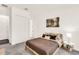 Bedroom features carpet, natural light, and ample closet space at 14907 Guava Bay Dr, Winter Garden, FL 34787