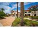 Community clubhouse with beautiful flowers and landscaping at 14907 Guava Bay Dr, Winter Garden, FL 34787