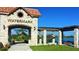 Stone structure entrance with a lake view at 14907 Guava Bay Dr, Winter Garden, FL 34787