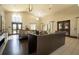 A well-appointed lobby with comfortable seating, a large arched window and exit doors at 14907 Guava Bay Dr, Winter Garden, FL 34787