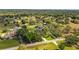 Aerial view of property showing lush greenery, mature trees, with home and surrounding property lines at 15245 Arabian Way, Montverde, FL 34756