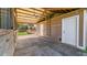 Barn featuring a ceiling fan, two entrances, and a ladder for storage or maintenance at 15245 Arabian Way, Montverde, FL 34756