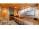 Relaxing game room offers fireplace, projector, screen, pool table, and cozy seating area at 15245 Arabian Way, Montverde, FL 34756