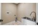 Practical laundry room with utility sink and connections at 15245 Arabian Way, Montverde, FL 34756