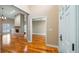 Inviting living room with wood floors, fireplace and a view of multiple rooms at 15245 Arabian Way, Montverde, FL 34756
