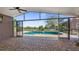 Relaxing enclosed patio with brick flooring and pool view to the outside at 15245 Arabian Way, Montverde, FL 34756