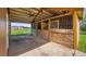 View of the barn stalls, each made with quality wood, showing a well-ventilated area at 15245 Arabian Way, Montverde, FL 34756