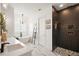 Modern bathroom with a standalone tub, walk-in shower with dual showerheads, and marble flooring at 1560 Ne 17Th St, Sumterville, FL 33585