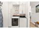 Laundry room featuring modern washer/dryer and lots of storage at 1560 Ne 17Th St, Sumterville, FL 33585