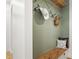 A conveniently located mudroom with built-in bench and custom coat racks at 1560 Ne 17Th St, Sumterville, FL 33585