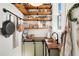 Walk-in pantry featuring open wooden shelves and a prep area at 1560 Ne 17Th St, Sumterville, FL 33585