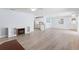 Bright living room featuring hardwood floors, recessed lighting, and an open design at 1615 Navidad St, The Villages, FL 32162
