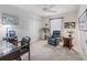 Bedroom featuring a fan, closet, window and desk at 1713 Jadestone Ter, The Villages, FL 32162